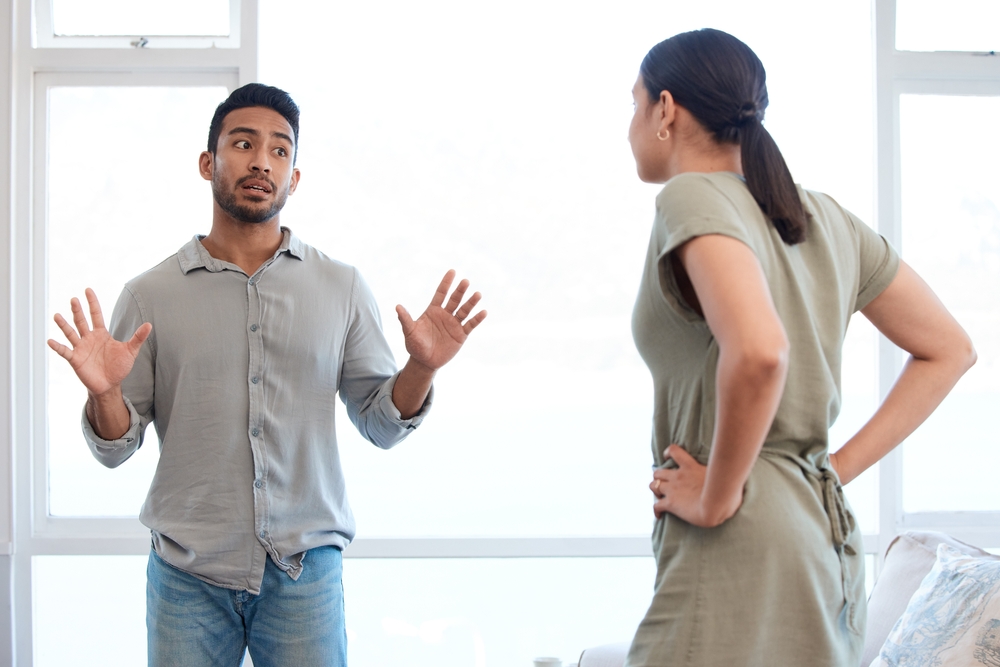 Frustrated couple, disagreement and fight with conflict for cheating affair, argument or accusation at home.